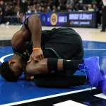 Timberwolves’ Star Edwards Exits Game With Knee Injury; DiVincenzo Suffers Torn Achilles