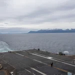 US Navy Supercarrier Transiting The Strait Of Magellan To The Atlantic