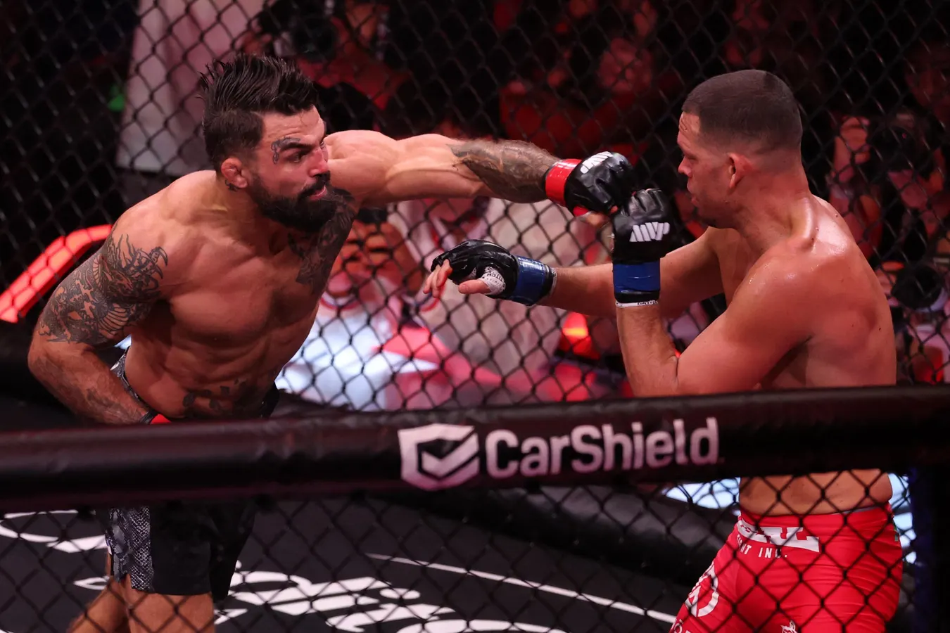 Mike Perry Batters Nate Diaz In Bloody TKO Win