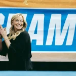 K.J. Kindler Will Tell You How OU Won Eight Titles. Catching Her Is Another Story