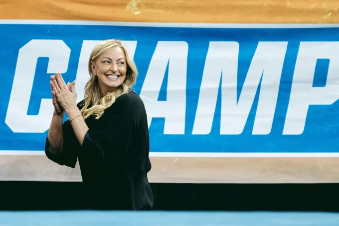 K.J. Kindler Will Tell You How OU Won Eight Titles. Catching Her Is Another Story
