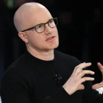 Coinbase Billionaire Says U.S. Investment Laws Make It ‘Illegal To Get Richer’