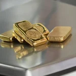 Gold And Silver Futures Fall As Fed Holds Rates Steady, Indicates Future Hikes
