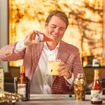 How ‘Pepper’ Bauman Built Crystal Hot Sauce Into A  Million Business
