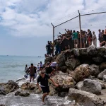 What To Know About Migrant Surge