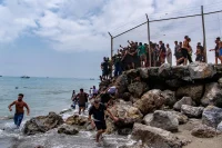 Spain’s Ceuta Territory Overwhelmed With Migrants From Morocco: What We Know