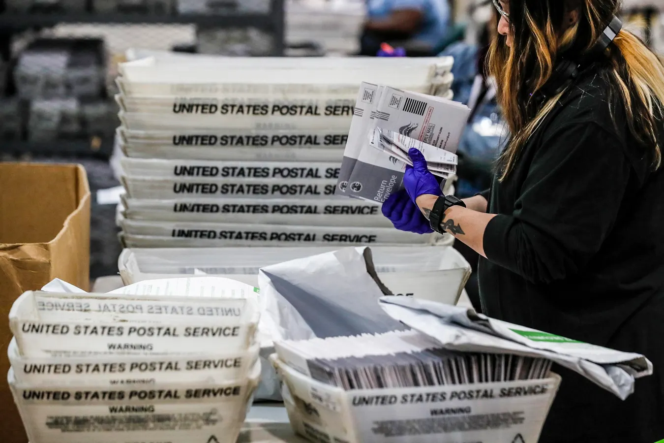 Judge Allows USPS Mail-In Ballot Rule To Take Effect—For Now