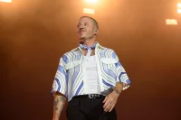 Petition Calls For Macklemore To Be Cut From Ed Sheeran Concert Lineup—Here’s Why