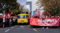 German auto workers protest historic job cuts — RT Business News